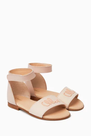 Logo-embossed Sandals in Leather