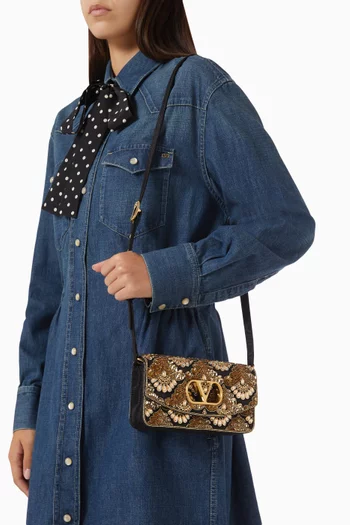 Small Vain Embroidered Clutch