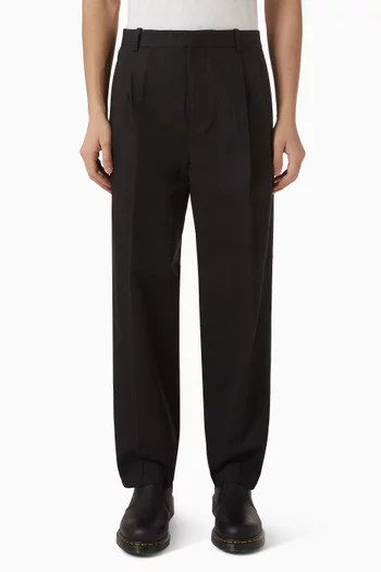 Pleated Relaxed-fit Tapered Pants in Cotton-blend