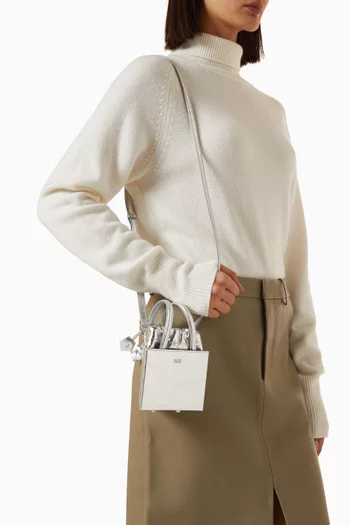 Small Triangle Bucket Bag in Leather