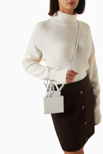 Small Triangle Bucket Bag in Leather