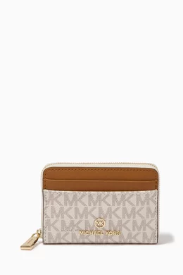 Buy Michael Kors White Jet Set Charm Zip Wallet in Logo Canvas for