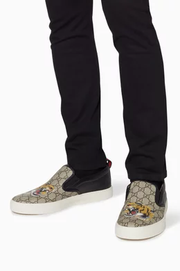 Buy Gucci Black Beige Black GG Supreme Tiger Slip On Sneakers For Men Online Ounass Bahrain