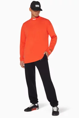 Orange long sleeve turtleneck top