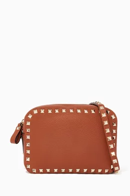 Buy Valentino Garavani Brown Rockstud Leather Camera Bag For Women Online Ounass Bahrain