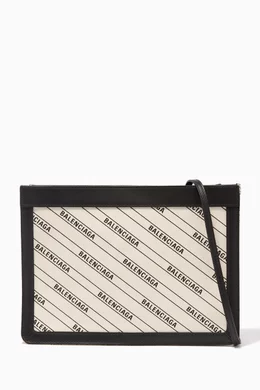 Buy Balenciaga Black Logo Stripe Canvas Pochette Bag For Women Online Ounass Bahrain