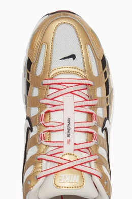 Nike p 6000 gold top