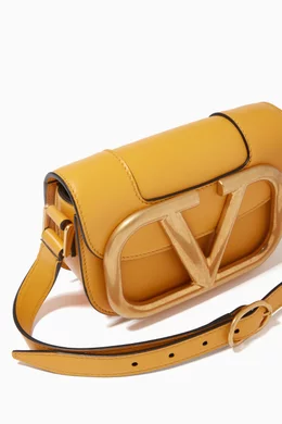 Buy Valentino Garavani Yellow Valentino Garavani Supervee Crossbody Bag in Calfskin For Women Online Ounass Bahrain