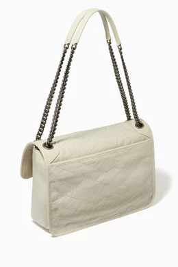 Buy SAINT LAURENT White Medium Niki Bag in Crinkled Vintage Leather For Women Online Ounass Bahrain