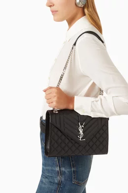 Medium envelope bag in grain de poudre embossed leather 2025
