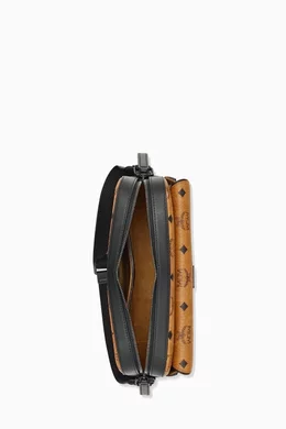 Buy MCM Brown Medium Aren Messenger Bag in Visetos For UNISEX Online Ounass Bahrain