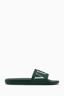 Buy Valentino Garavani Green Valentino Garavani VLTN Slide Sandals in Rubber For Men Online Ounass Bahrain