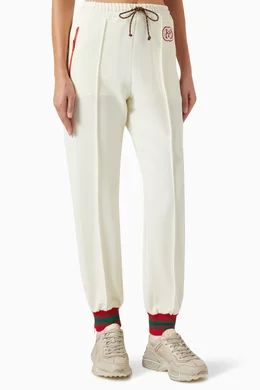 Buy Gucci Neutral GG Logo Patch Track Pants in Jersey For Women Online Ounass Bahrain