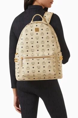 Buy MCM Neutral Medium Stark Side Studs Visetos Backpack in Coated canvas For UNISEX Online Ounass Bahrain