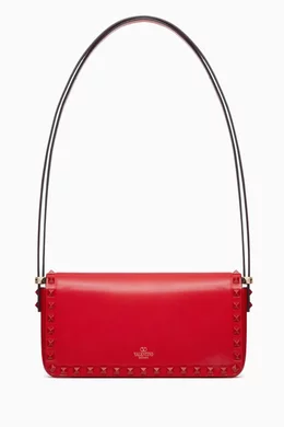 Buy Valentino Garavani Red Valentino Garavani Rockstud 23 East West Shoulder Bag in Calfskin Leather For Women Online Ounass Bahrain