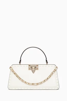 Small rockstud top handle bag 2025