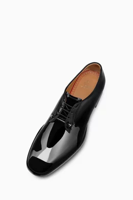Louboutin patent leather shoes top