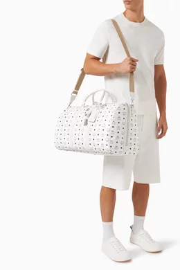 Buy MCM White Xlarge Ottomar Weekender 55 Duffle Bag in Coated Canvas For Men Online Ounass Bahrain
