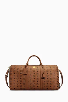 Buy MCM Brown Medium Ottomar Weekender 45 Duffle Bag in Coated Canvas For Men Online Ounass Bahrain