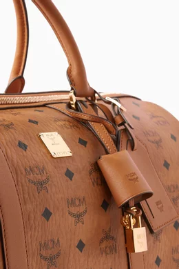Buy MCM Brown Medium Ottomar Weekender 45 Duffle Bag in Coated Canvas For Men Online Ounass Bahrain