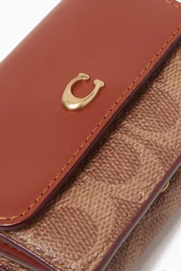 Buy Coach Brown Mini Tri fold Signature Wallet in Coated canvas For Women Online Ounass Bahrain