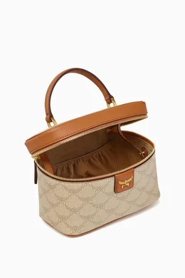 Buy MCM Neutral Small Himmel Vanity Case Top handle Bag in Coated canvas For Women Online Ounass Bahrain