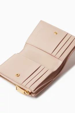 Buy Bottega Veneta Pink Small Bi fold Cassette Zip Wallet in Intrecciato Leather For Women Online Ounass Bahrain