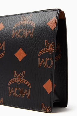 Buy MCM Black Aren Chain Pouch in Visetos Canvas For Women Online Ounass Bahrain