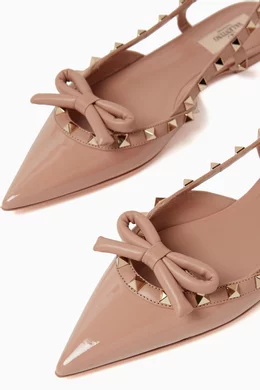 Buy Valentino Garavani Pink Valentino Garavani Rockstud Bow Ballerinas in Patent Leather For Women Online Ounass Bahrain
