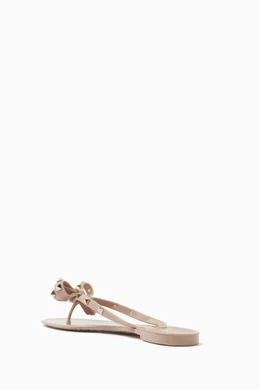 Buy Valentino Garavani Pink Rockstud Bow Rubber Thong Sandals For
