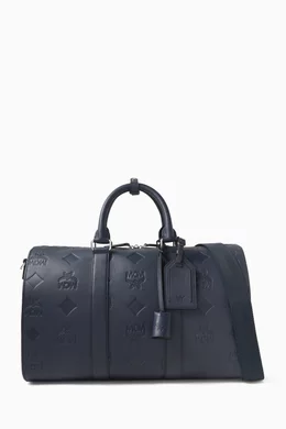 Buy MCM Blue Ottomar Weekender 45 Duffle Bag in Embossed Leather For Men Online Ounass Bahrain
