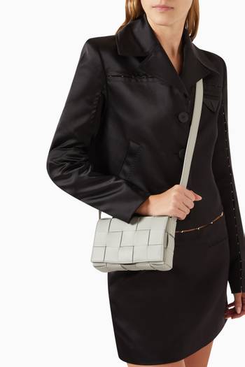 hover state of Small Cassette Crossbody Bag in Intreccio Leather