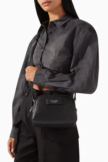 حقيبة كروس صغيرة بتصميم مبطّن جلد