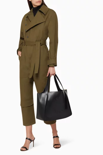 حقيبة يد جلد صناعي بشعار الماركة مزين بثقوب