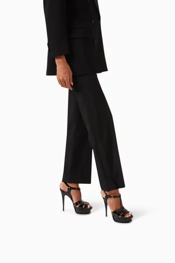 صندل تريبيوت بنعل سميك وكعب 135 مم جلد لامع