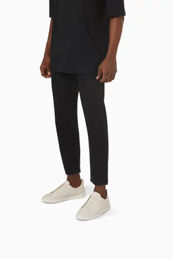 سنيكرز جلد غزال بحياكة ثلاثية