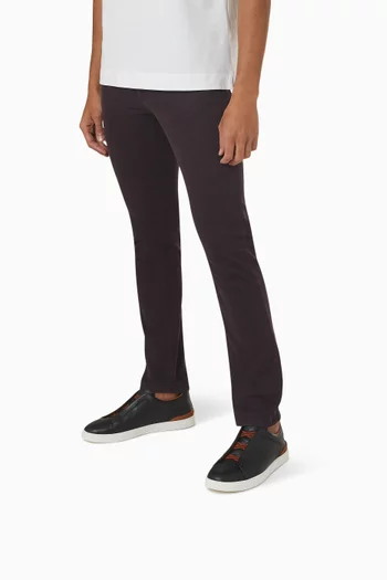 سنيكرز أسفل الكاحل مزين بحياكة ثلاثية جلد غزال