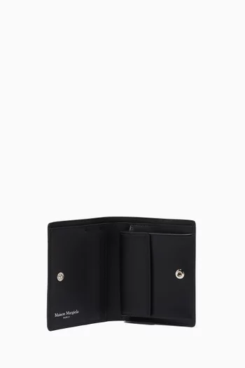Four-stitch Compact Flap Wallet in Leather