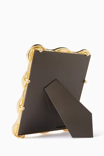 إطار مموج ذهب