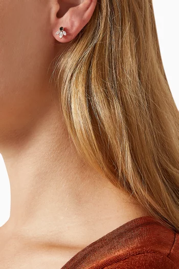 أقراط بيكسي وينجز مرصعة بماس ذهب عيار 18