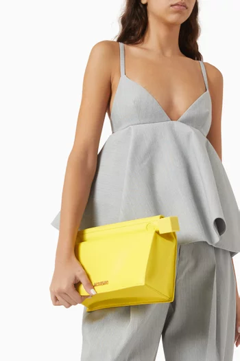 La Petite Pochette Rond Carré Clutch Bag in Leather