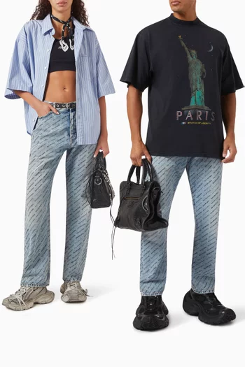بنطال جينز بشعار الماركة من الستنسل بالكامل