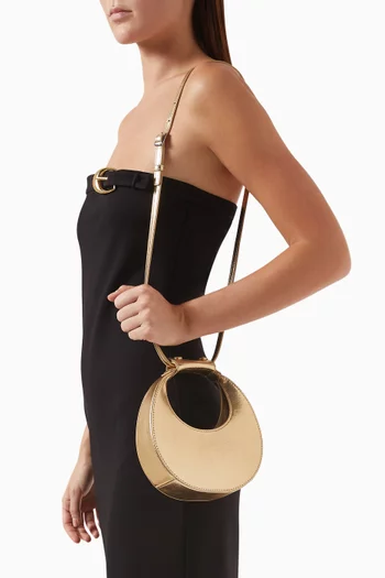 حقيبة جودنايت بتصميم هلال جلد لامع