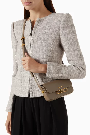 حقيبة كروس للهاتف بشعار الماركة جلد