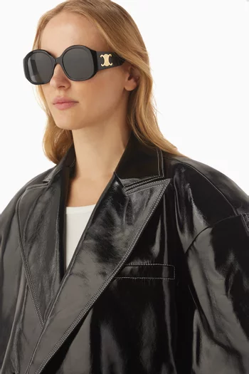 نظارة شمسية كبيرة بشعار تريومف وإطار دائري أسيتات