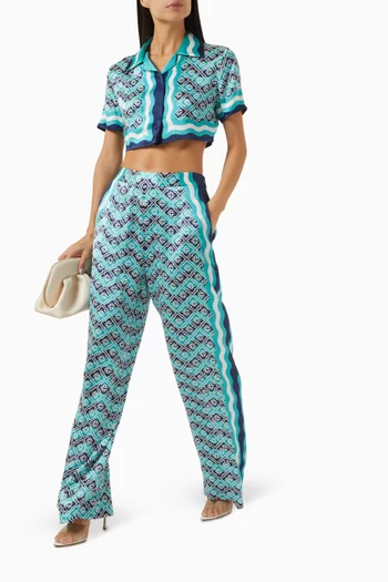 قميص قصير بحافة مموجة وشعار الماركة حرير ستان