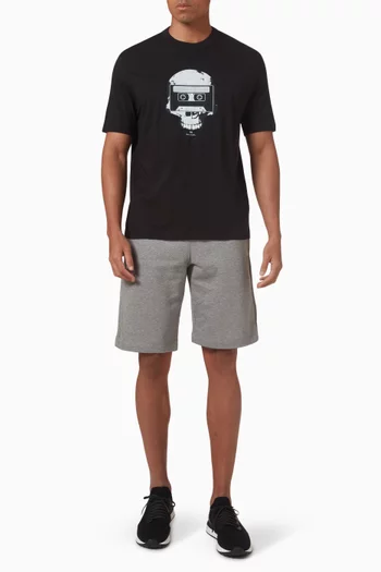 تي شيرت بطبعة شريط وجمجمة قطن عضوي