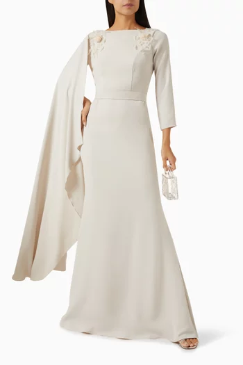 فستان طويل مزين بزهور بارزة