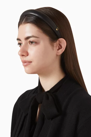 طوق رأس بشعار الماركة جلد