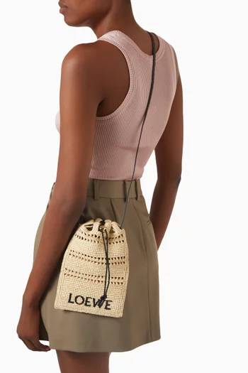 حقيبة بتصميم جيب برباط تضييق خوص لويفي × بولا ايبيزا